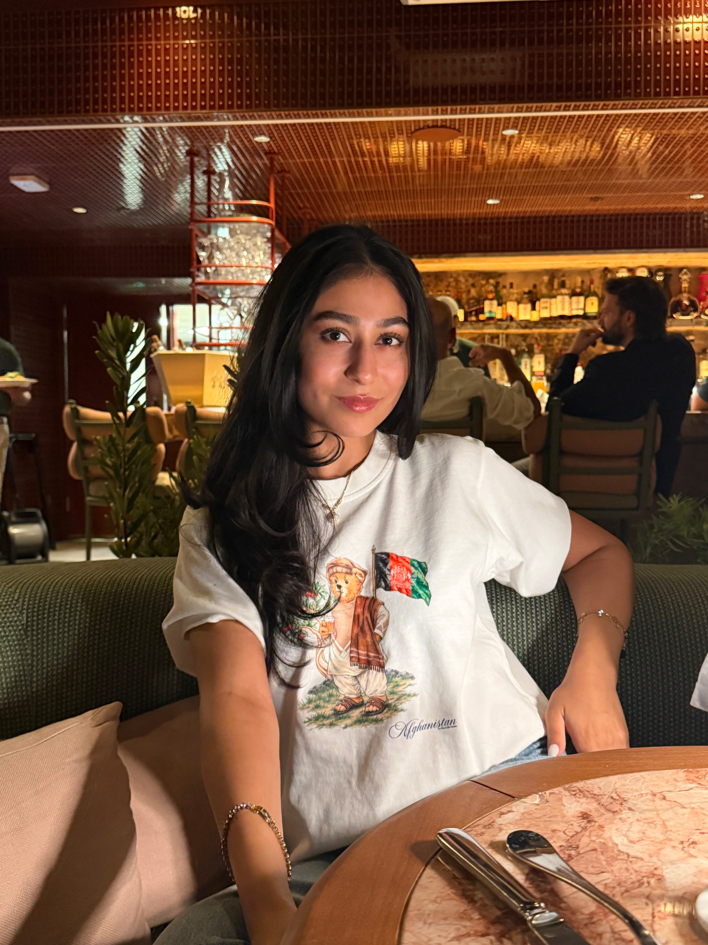 Project Paradise tee at dinner
