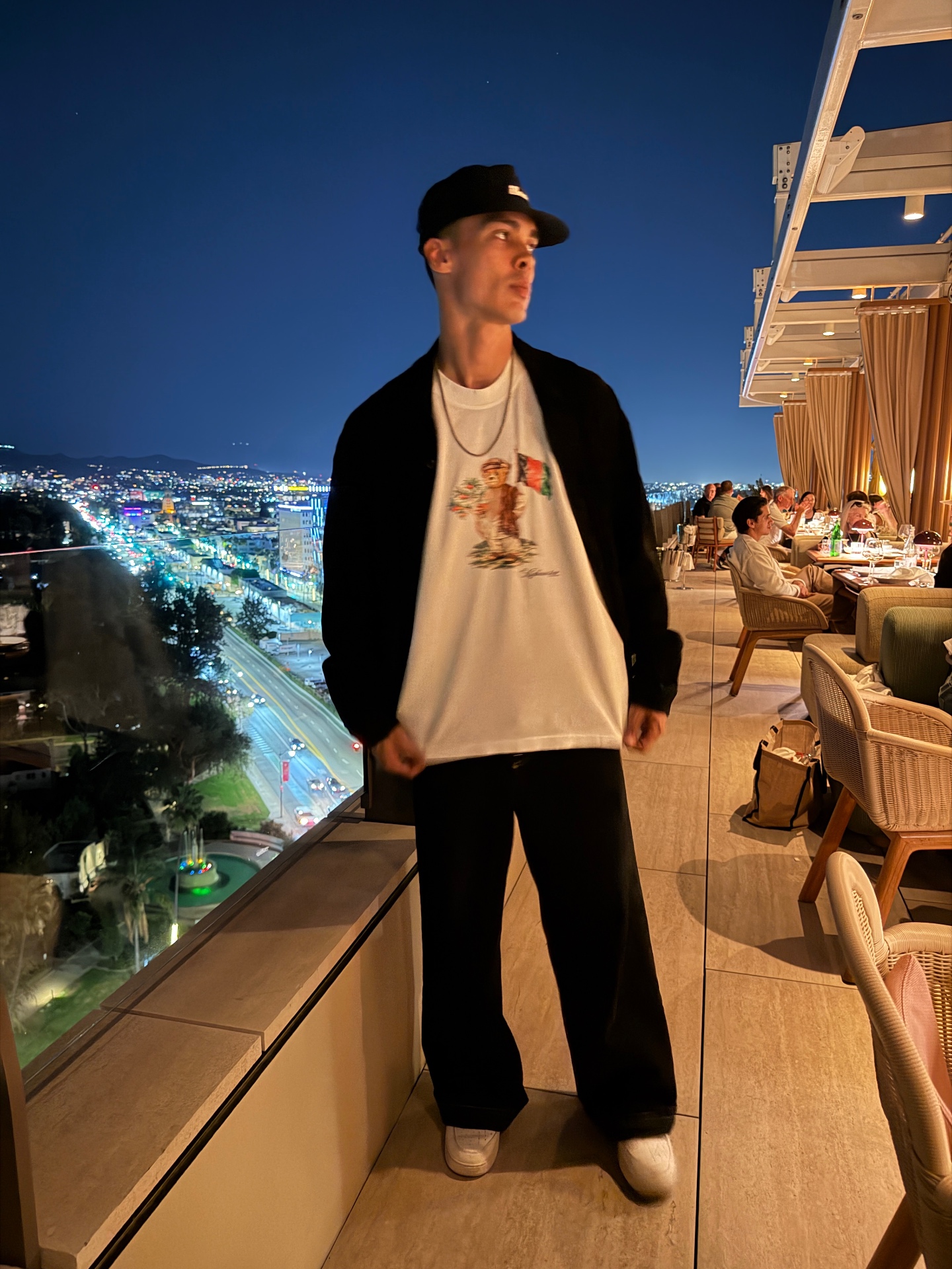 Project Paradise tee on the rooftop terrace
